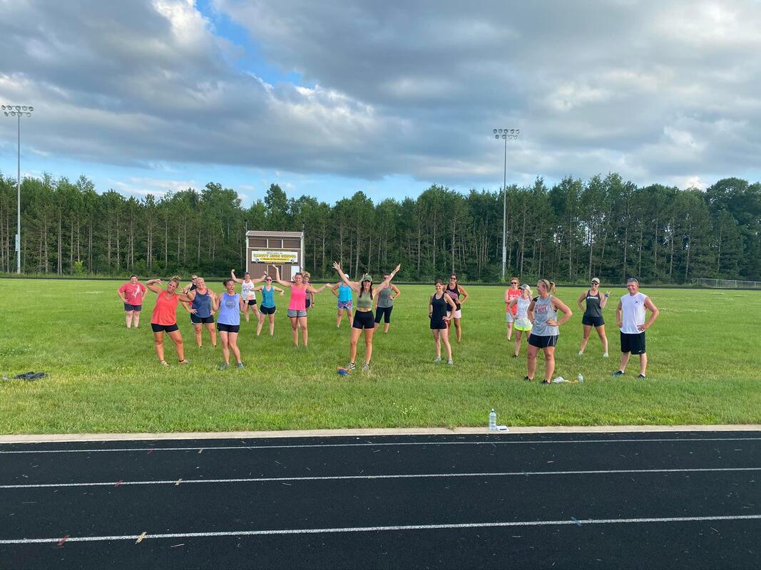 Neighbors exercising on the Cadott track