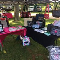 Kids gathered under the trees at Riverview Park during Nabor Days