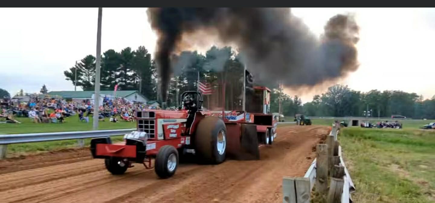 Tractor throwing smoke during the 2025 Nabor Days Truck and Tractor Pull